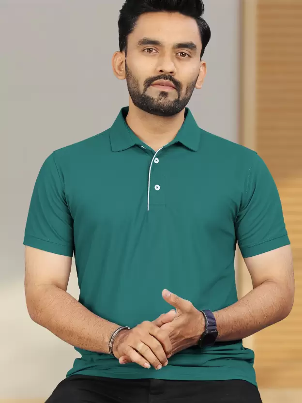 Man wearing a stylish green polo t-shirt from the best t-shirt store online – TheUrbansty Collective Hub. Let me know if you want variations based on color, style, or for other products too